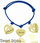 Pozłacana srebrna bransoletka trzy serca ze stópkami